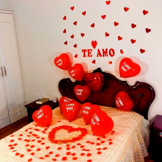 Surprise in the room with heart balloons