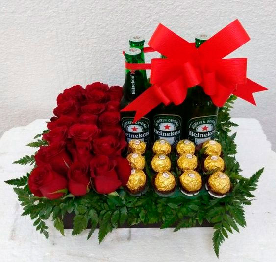 Basket with beer, roses and chocolates for mom